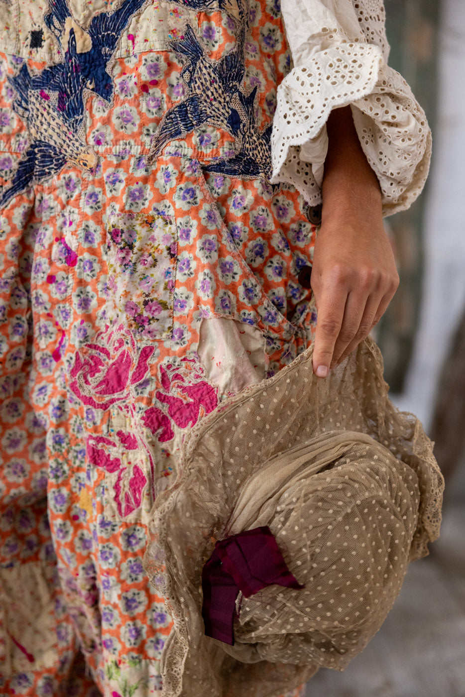 Magnolia Pearl artisan floral dress with bird embroidery, lace sleeves, and vintage hat