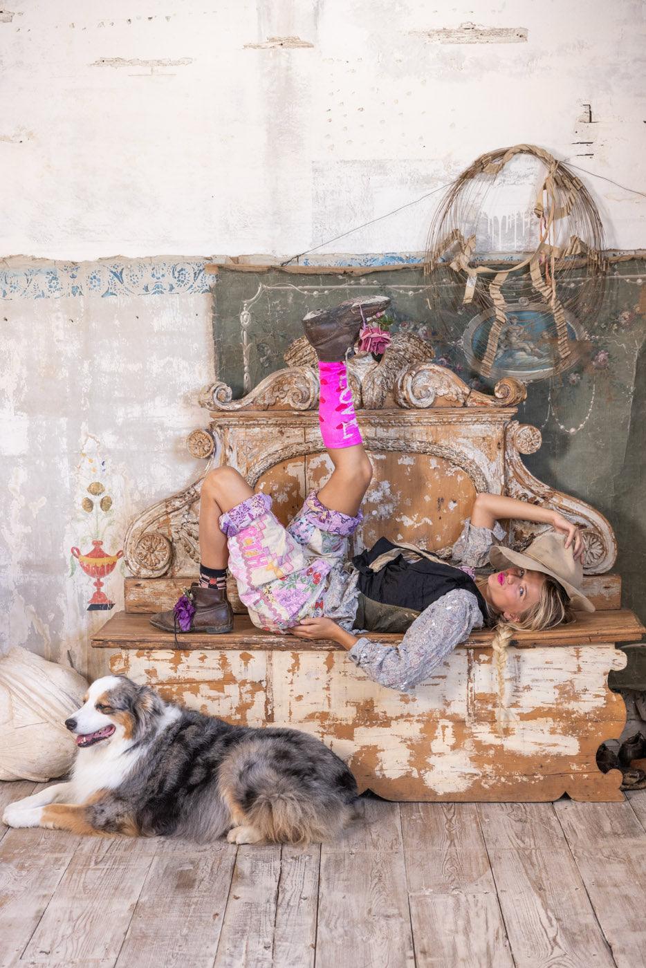 Magnolia Pearl artisan vintage style whimsical clothing model on distressed bench with dog