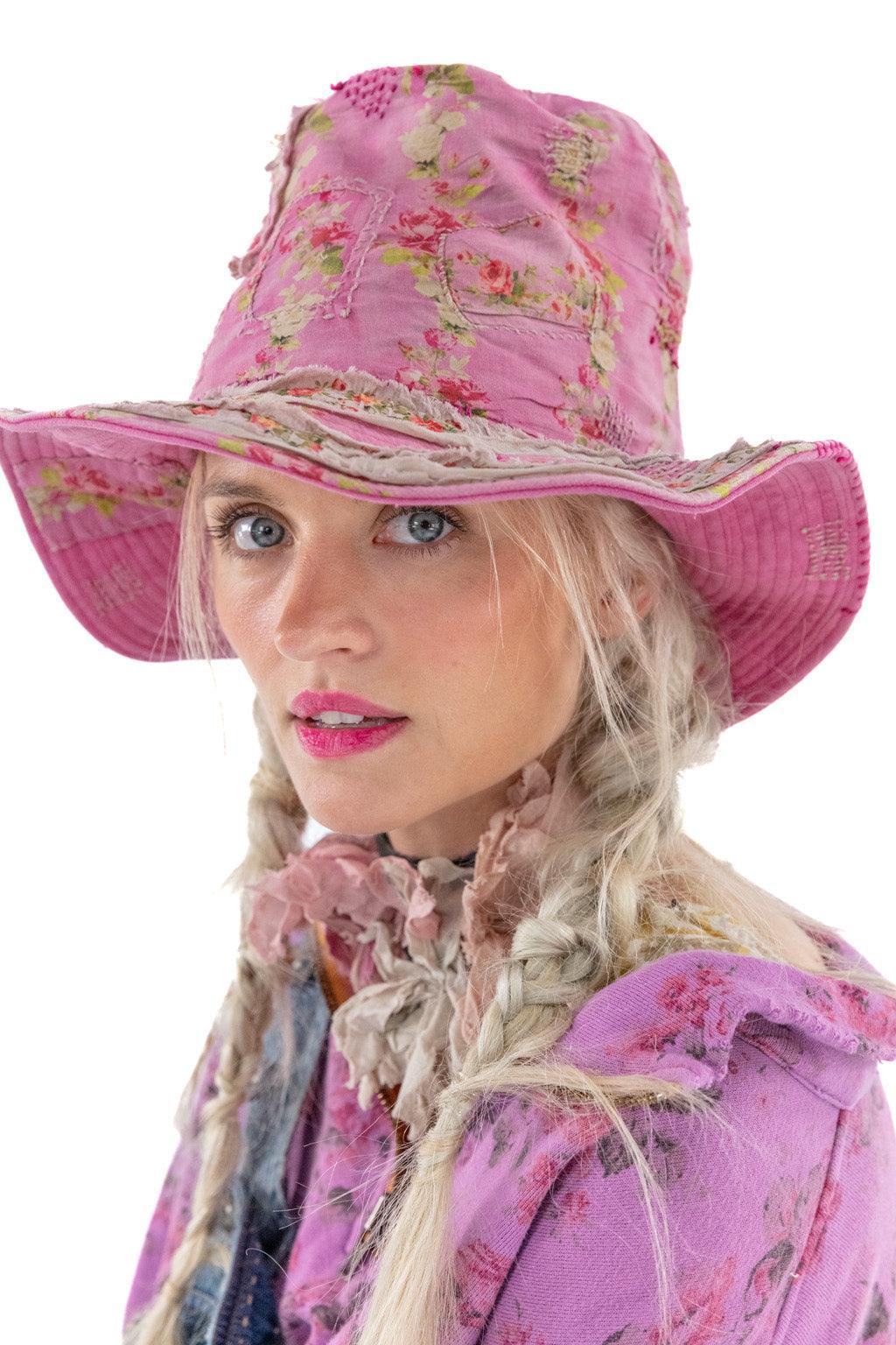 Woman in Magnolia Pearl pink floral patchwork hat and vintage whimsical artisan clothing