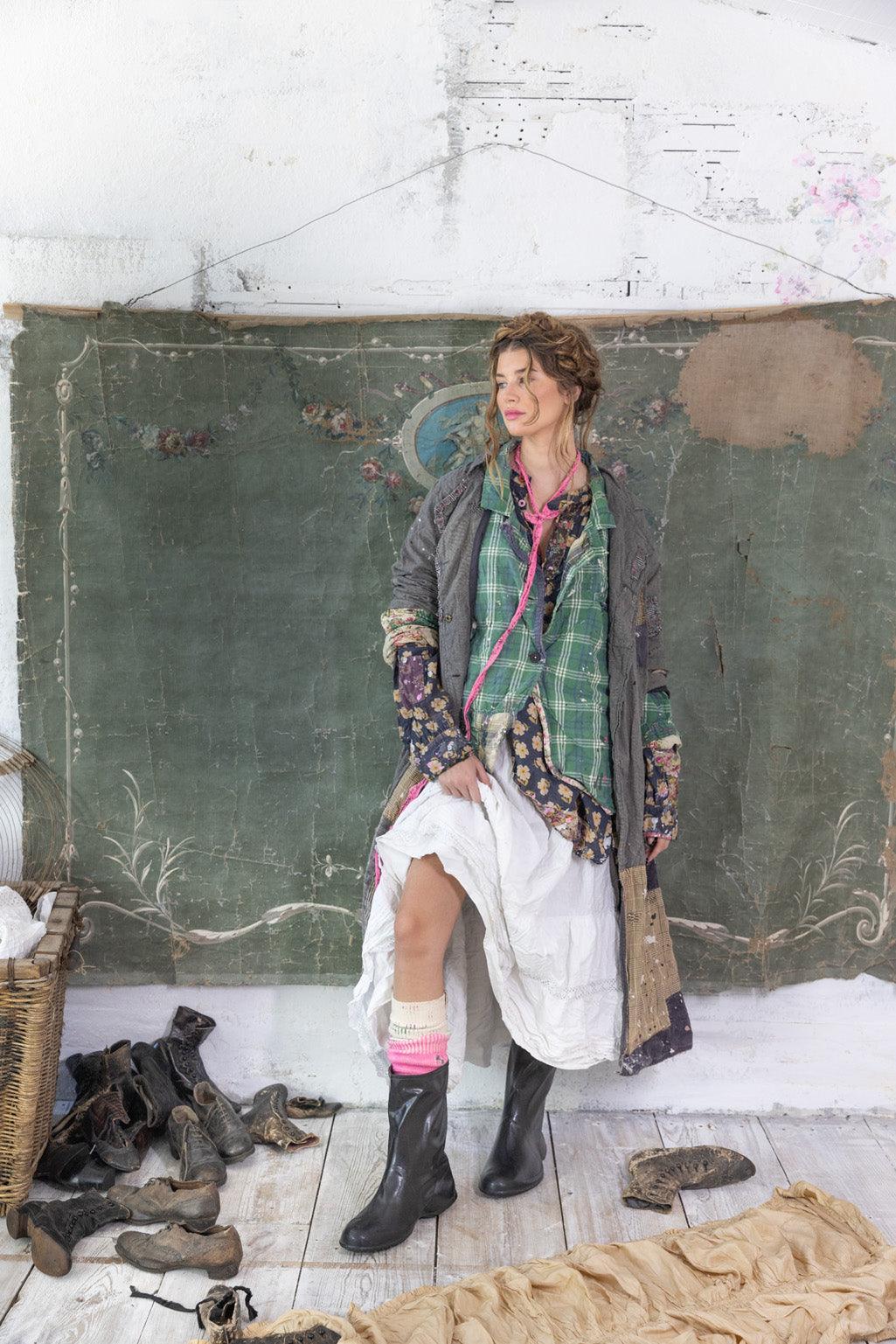 Woman in Magnolia Pearl artisan jacket, layered vintage dress, whimsical boho rustic style