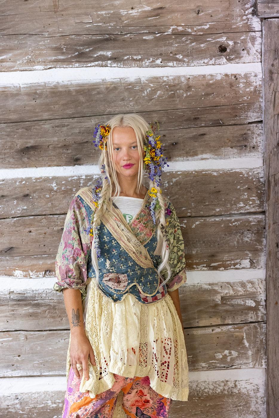 Woman in Magnolia Pearl artisan vintage clothing, whimsical floral designs, boho style decor