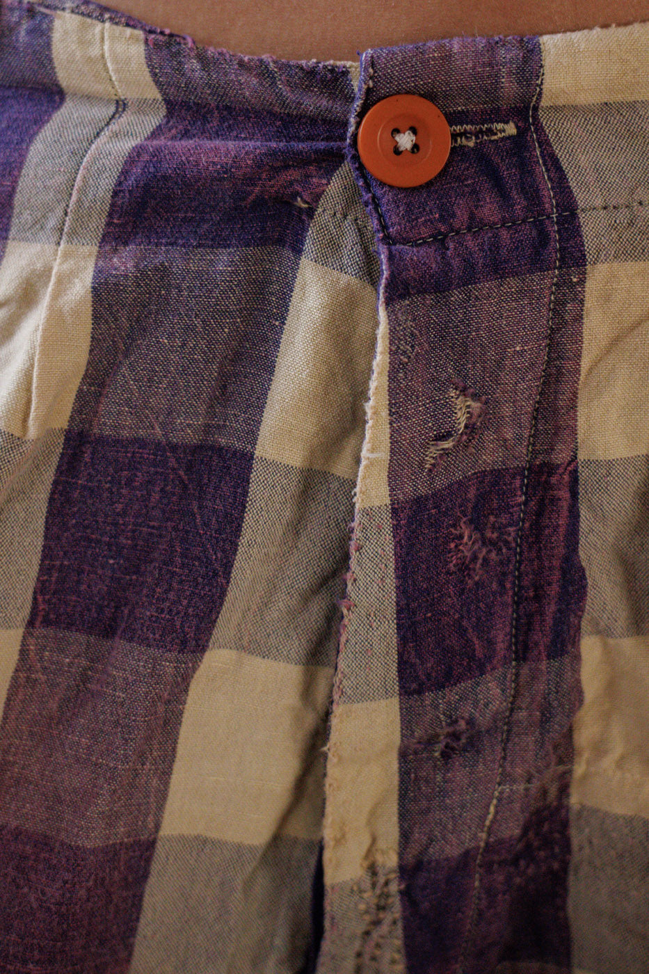 Magnolia Pearl artisan plaid pants with whimsical vintage-style distressing and button detail