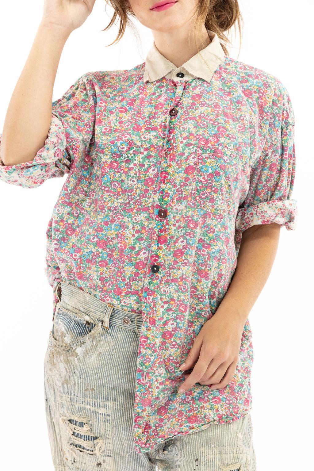 Woman in Magnolia Pearl vintage floral shirt and black hat, artisan whimsical clothing style