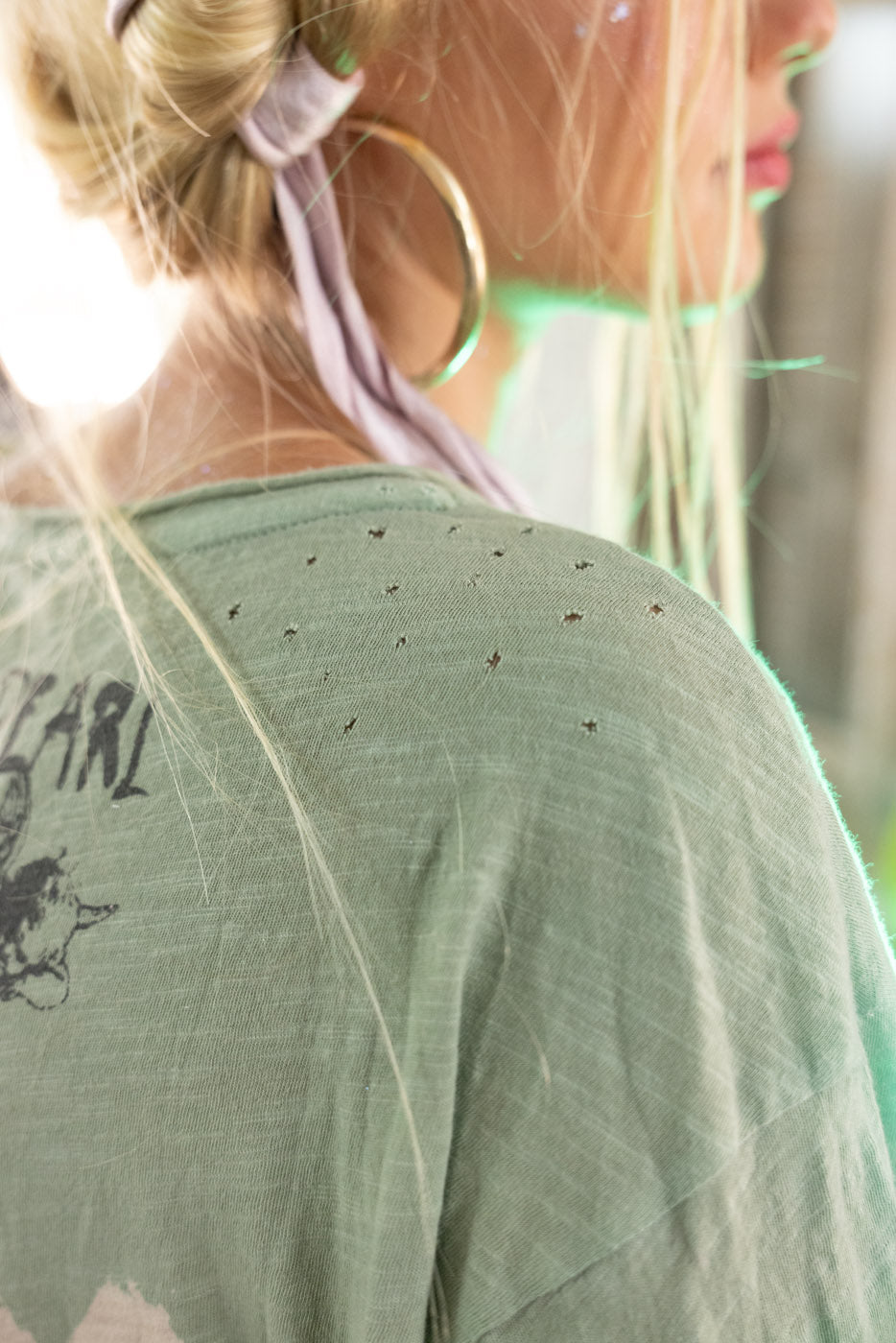  Model in faded green AC/DC top – vintage rock look by Magnolia Pearl.