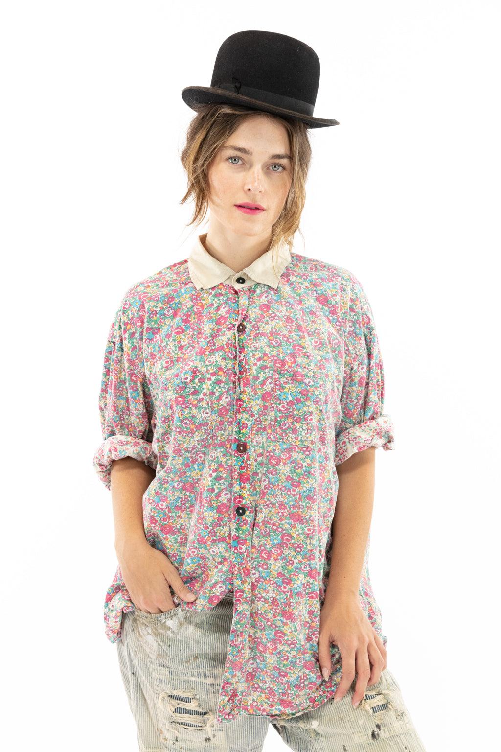 Woman in Magnolia Pearl vintage floral shirt and black hat, artisan whimsical clothing style