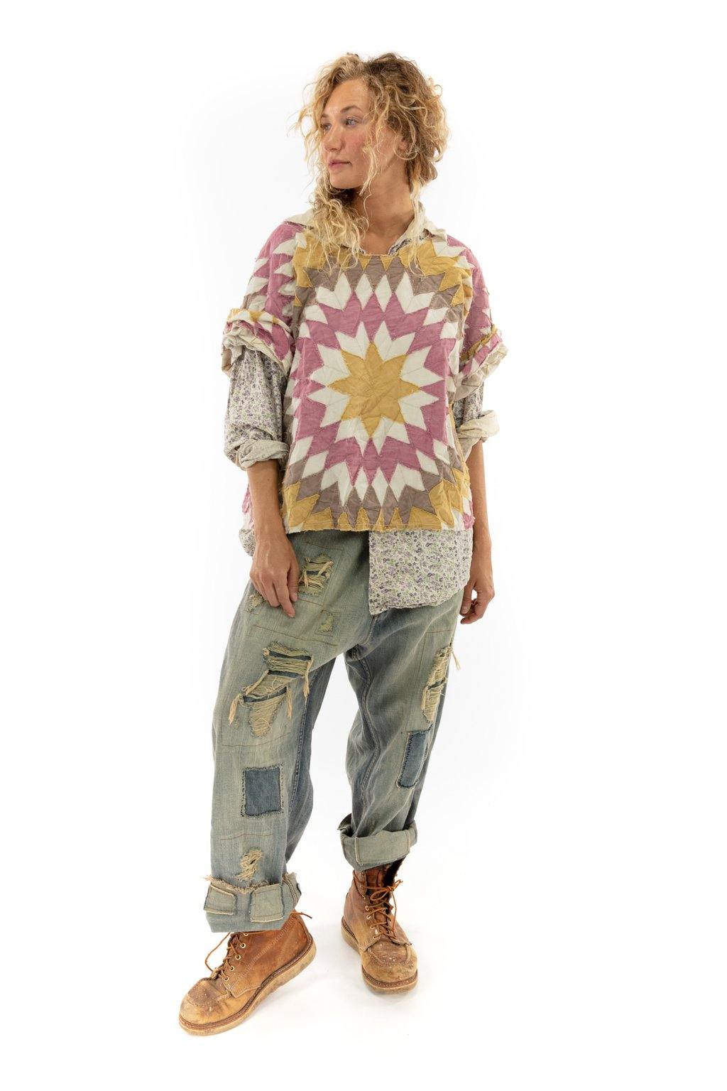 Woman in Magnolia Pearl artisan quilted star top, floral shirt, distressed jeans, vintage boots