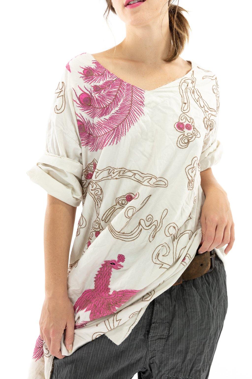 Magnolia Pearl artisan top with whimsical pink peacock embroidery and vintage-style design